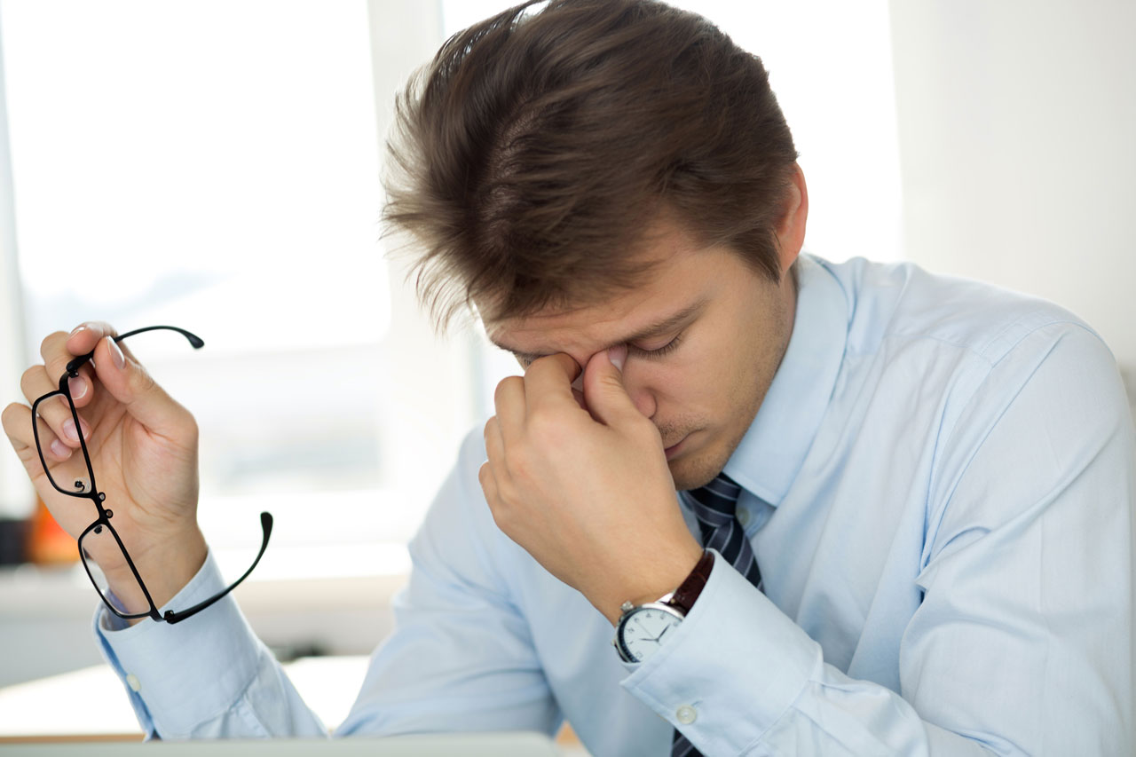 Unzufriedenheit und Kopfschmerzen sind die typischen Stress-Symptome.